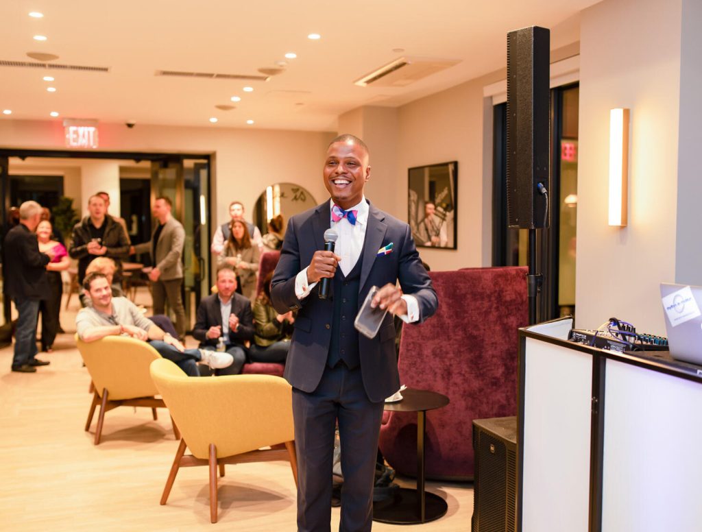 Host speaking at a resident event inside The Willoughby